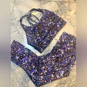 Lululemon cropped pants and matching sports bra in floral print. Both size 4.